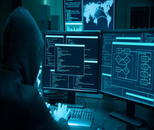 male hacker using laptop